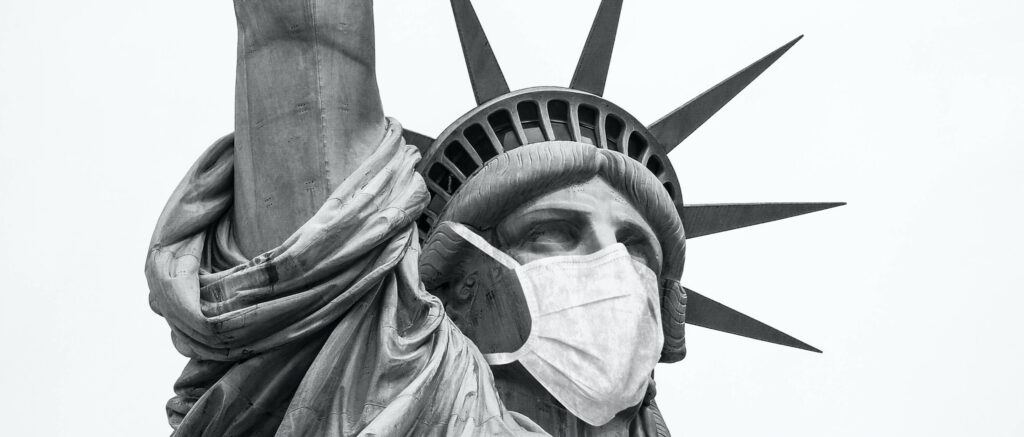 Statue of Liberty with a surgical mask on